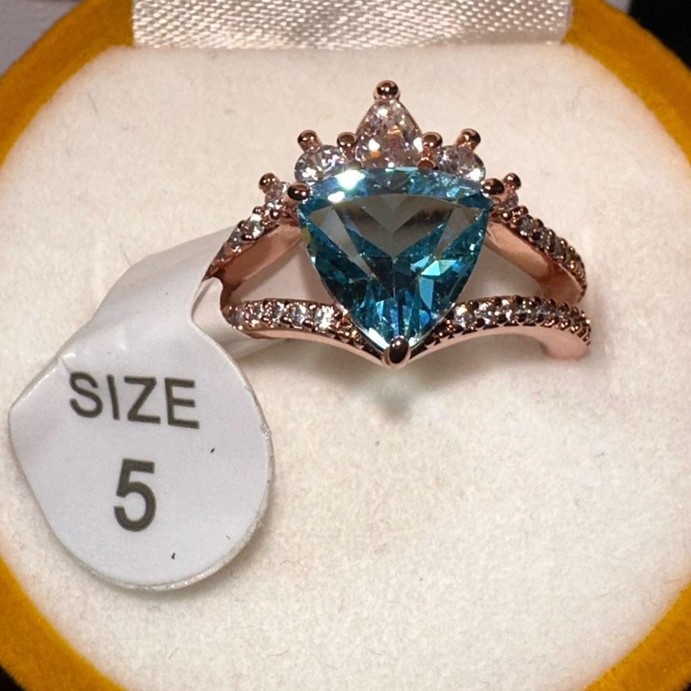 Lab Created Topaz Blue on rose gold plating